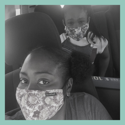 Akila and Ta’Siyah Canton Photograph Wearing Mask