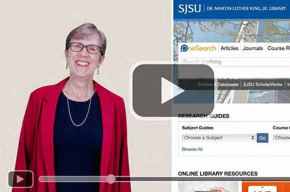 Screenshot of video play button with interim dean Ann Agee in the background