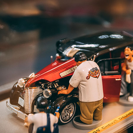 Photo of Toy Lowrider Car and People