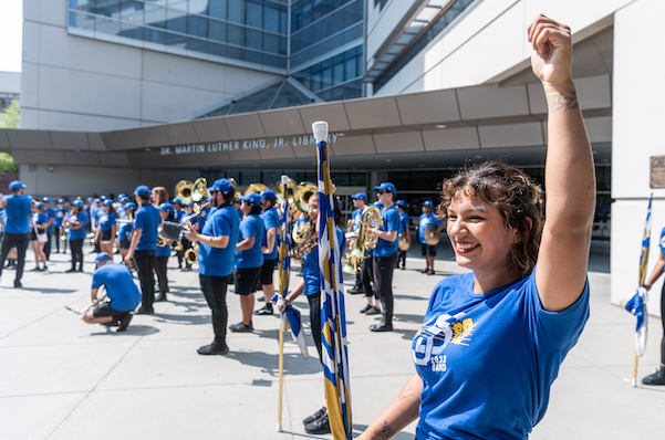 SJSU Marching Band performing outside of the library