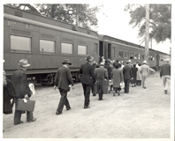 Evacuees boarding train at Santa Anita, California