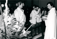 Two men hug after reciting their wedding vows
